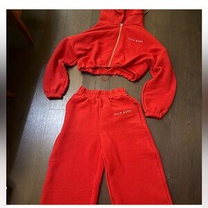 BRAND NEW NEVER WORN SIZE S FLARE
Red Two-Piece Hoodie and Pants Set